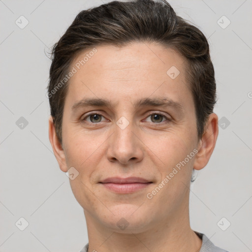 Joyful white adult male with short  brown hair and brown eyes