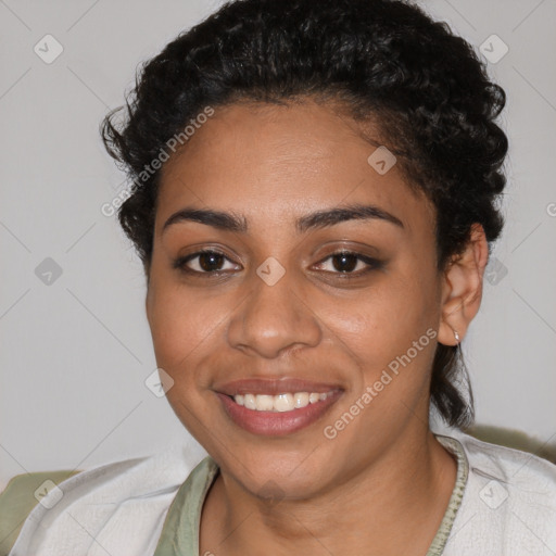 Joyful latino young-adult female with short  black hair and brown eyes