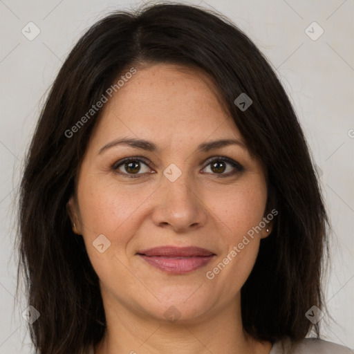 Joyful white adult female with medium  brown hair and brown eyes