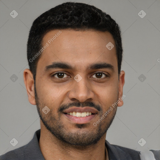 Joyful latino young-adult male with short  black hair and brown eyes