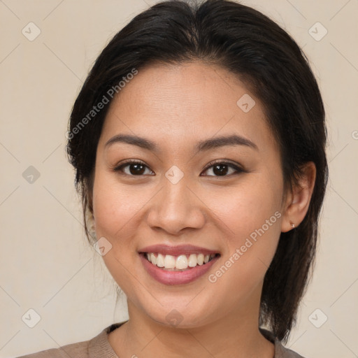 Joyful white young-adult female with medium  brown hair and brown eyes