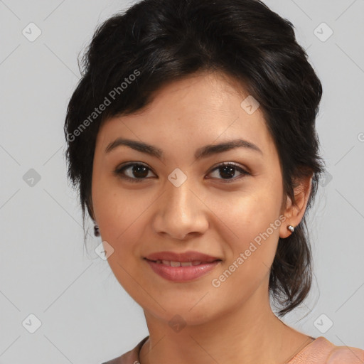 Joyful asian young-adult female with medium  black hair and brown eyes