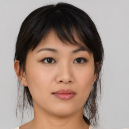 Neutral asian young-adult female with medium  brown hair and brown eyes