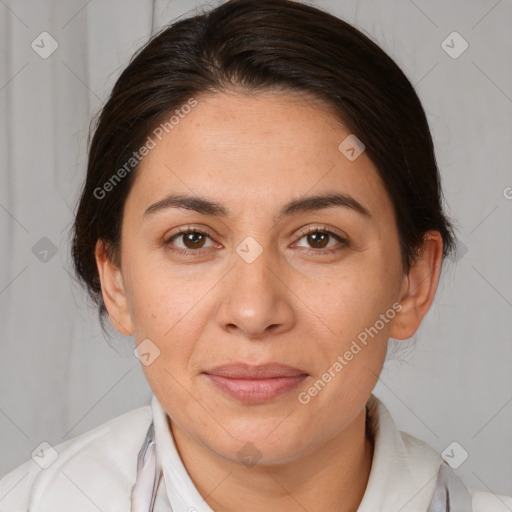 Joyful white adult female with medium  brown hair and brown eyes