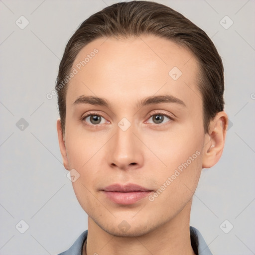 Neutral white young-adult male with short  brown hair and brown eyes