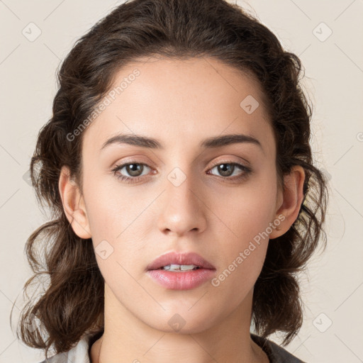 Neutral white young-adult female with medium  brown hair and brown eyes