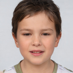 Joyful white child female with short  brown hair and brown eyes