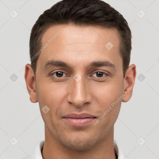 Joyful white young-adult male with short  brown hair and brown eyes