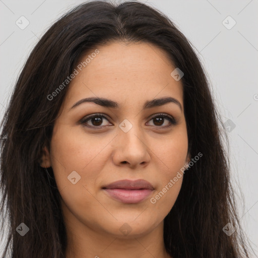 Joyful latino young-adult female with long  brown hair and brown eyes