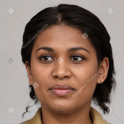 Joyful black young-adult female with medium  black hair and brown eyes