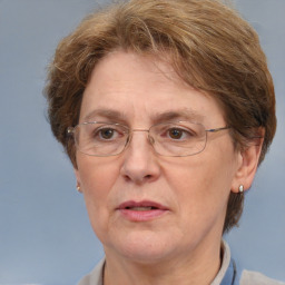 Neutral white middle-aged female with short  brown hair and brown eyes