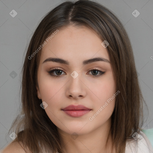 Neutral white young-adult female with long  brown hair and brown eyes