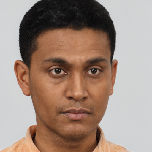 Neutral latino young-adult male with short  brown hair and brown eyes