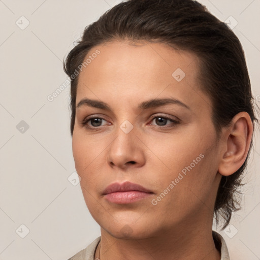 Neutral white young-adult female with short  brown hair and brown eyes