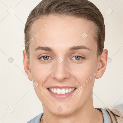 Joyful white young-adult female with short  brown hair and grey eyes