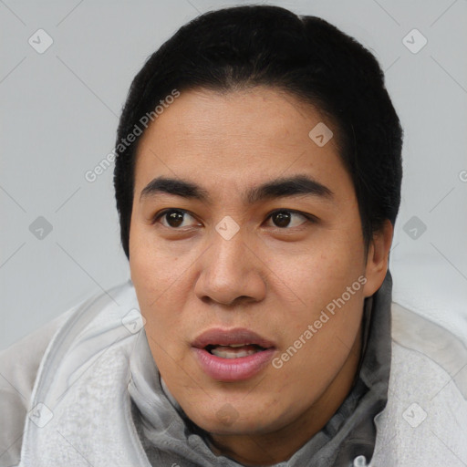 Joyful latino young-adult female with short  black hair and brown eyes