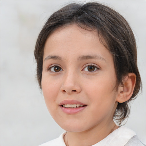Joyful white child female with medium  brown hair and brown eyes