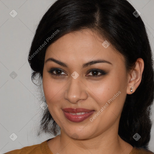 Joyful latino young-adult female with medium  brown hair and brown eyes