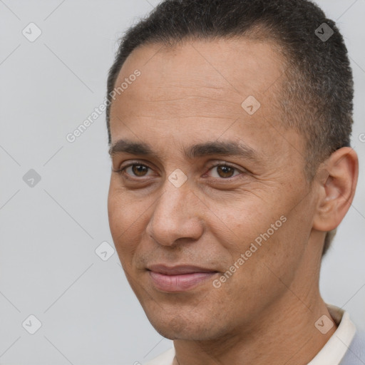 Joyful white adult male with short  brown hair and brown eyes