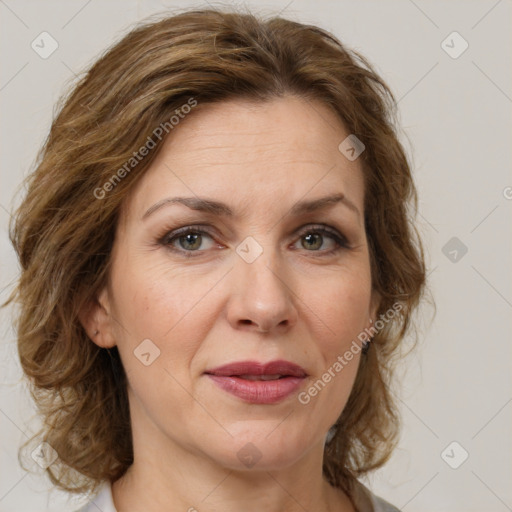 Joyful white adult female with medium  brown hair and grey eyes