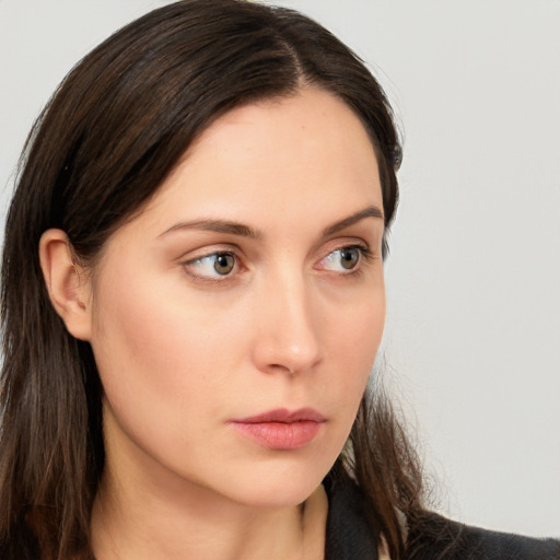 Neutral white young-adult female with long  brown hair and grey eyes