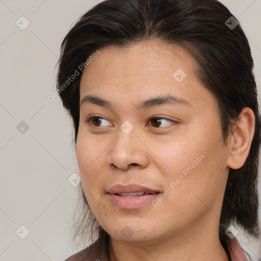 Joyful white young-adult female with medium  brown hair and brown eyes