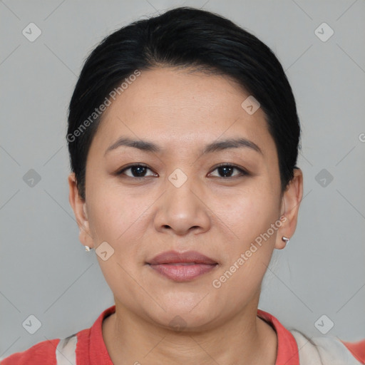 Joyful asian young-adult female with short  black hair and brown eyes