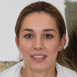 Joyful white young-adult female with medium  brown hair and brown eyes