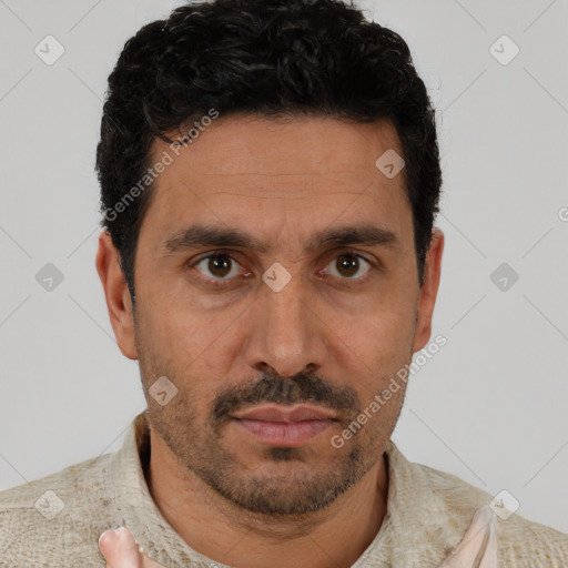 Neutral white young-adult male with short  black hair and brown eyes