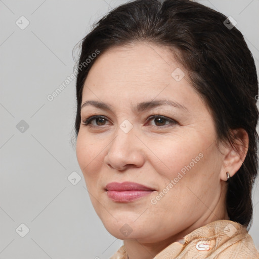 Joyful white adult female with medium  brown hair and brown eyes