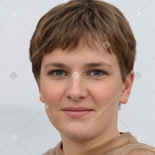 Joyful white young-adult female with short  brown hair and grey eyes