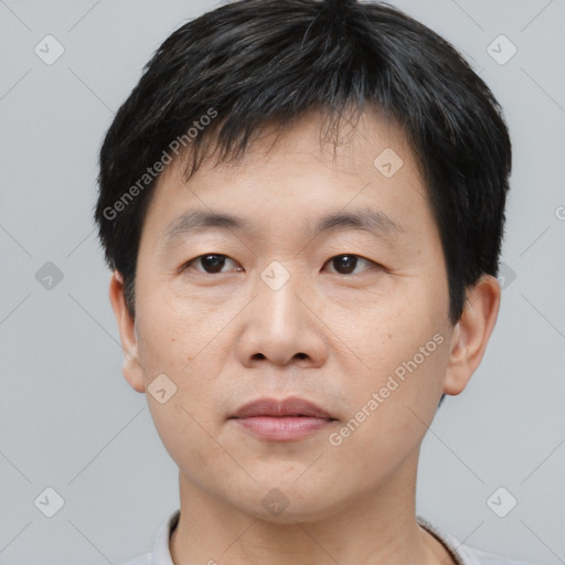 Neutral asian young-adult male with short  black hair and brown eyes