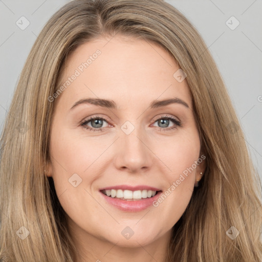 Joyful white young-adult female with long  brown hair and grey eyes