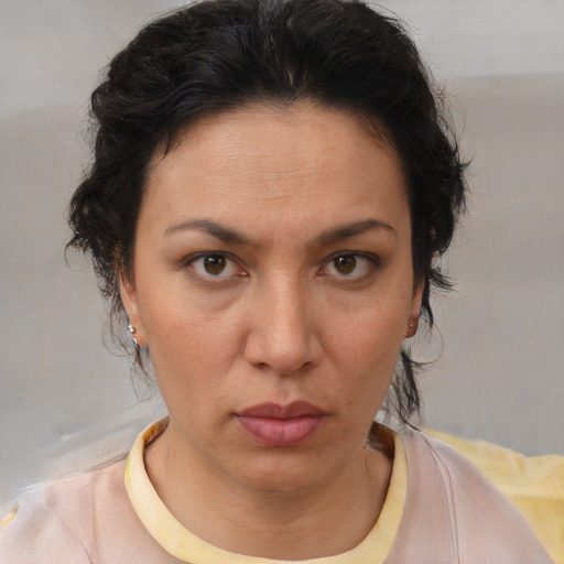 Neutral white young-adult female with short  brown hair and brown eyes