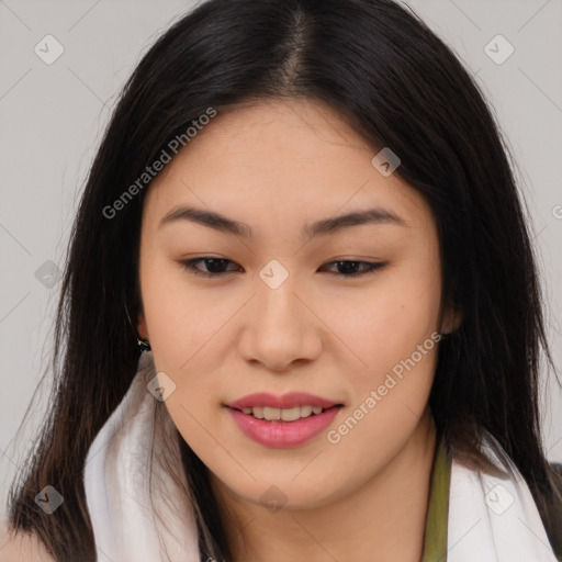 Joyful latino young-adult female with long  brown hair and brown eyes