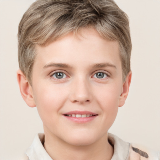 Joyful white child male with short  brown hair and grey eyes