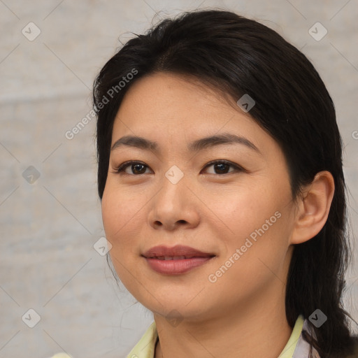 Joyful asian young-adult female with medium  brown hair and brown eyes