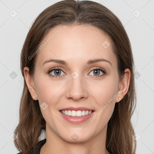 Joyful white young-adult female with long  brown hair and grey eyes