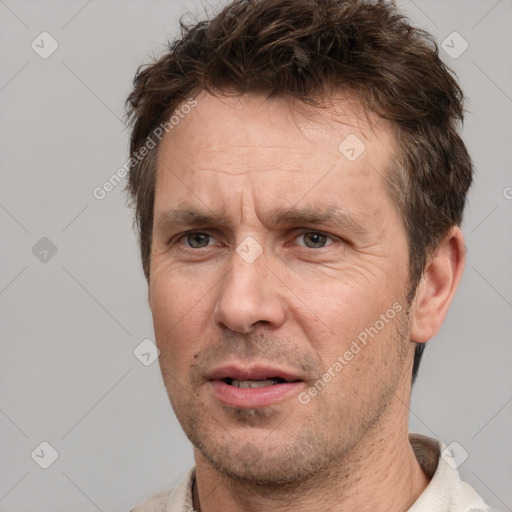 Neutral white adult male with short  brown hair and brown eyes