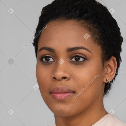 Joyful latino young-adult female with short  black hair and brown eyes