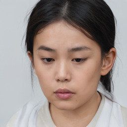 Neutral asian young-adult female with medium  brown hair and brown eyes