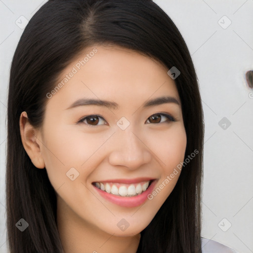 Joyful white young-adult female with long  brown hair and brown eyes