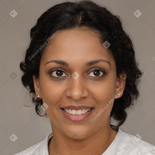 Joyful black young-adult female with medium  brown hair and brown eyes