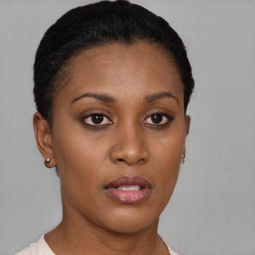 Neutral black young-adult female with short  brown hair and brown eyes
