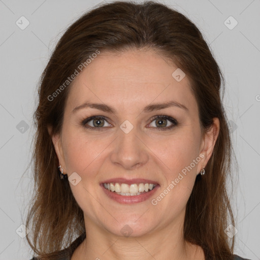 Joyful white young-adult female with long  brown hair and grey eyes