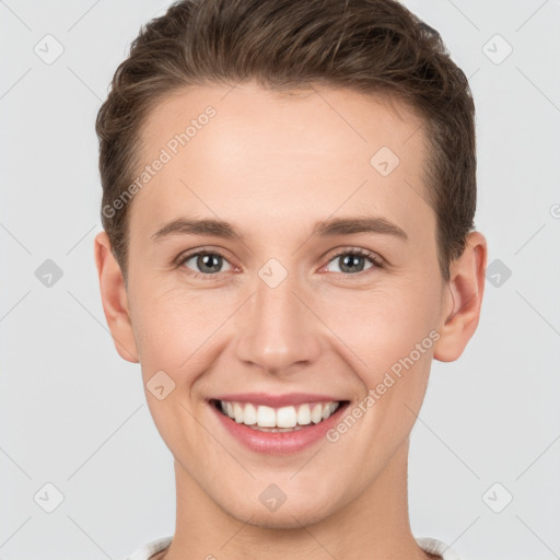 Joyful white young-adult female with short  brown hair and grey eyes