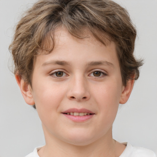 Joyful white child male with short  brown hair and brown eyes