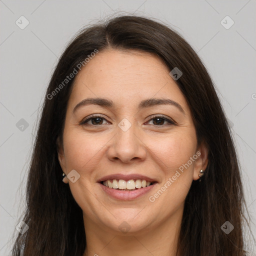 Joyful white young-adult female with long  brown hair and brown eyes