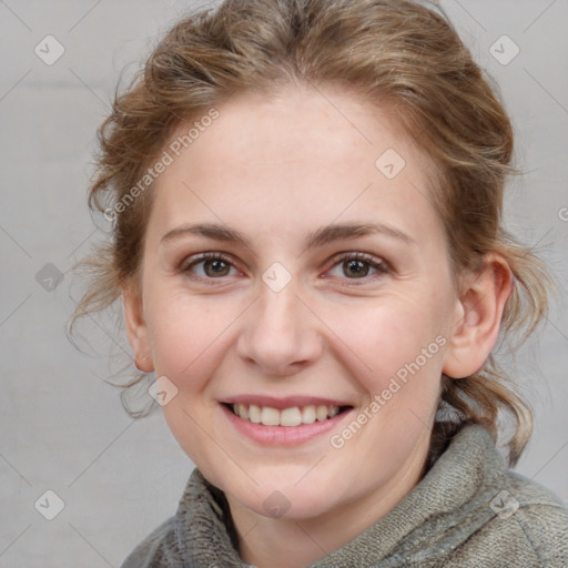 Joyful white young-adult female with medium  brown hair and blue eyes