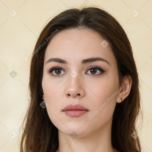 Neutral white young-adult female with long  brown hair and brown eyes